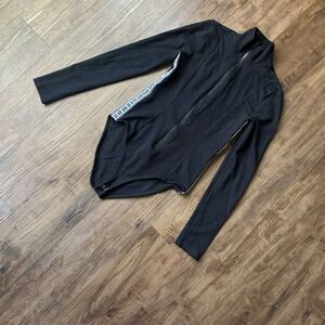 Forever 21 sport long sleeve mock neck zip up bodysuit.